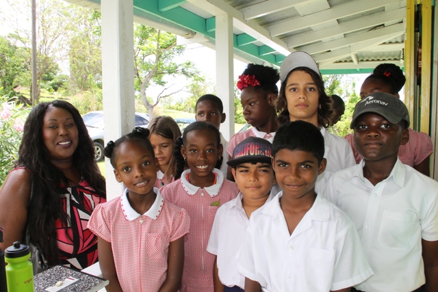 Denise Morgan, Principal of the Montessori Academy Nevis with a group of Grade 4 and 5 students including Denise Summers (first row left), Alexandria Johnson (second row left) and Dylan Theron (second row right) at the Nevisian Heritage Village during the Ministry of Tourism’s Open Day, a part of Exposition Nevis on May 11, 2017